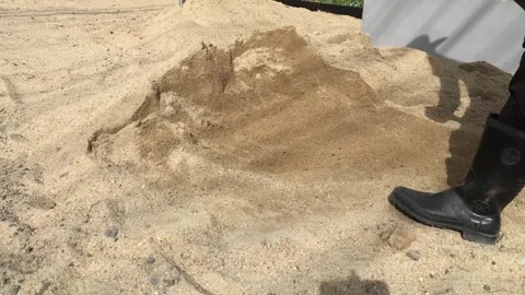 Construction workers mixing cement, concrete Stock Footage 345582309