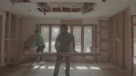 Construction workers move supplies Stock Footage 144294951