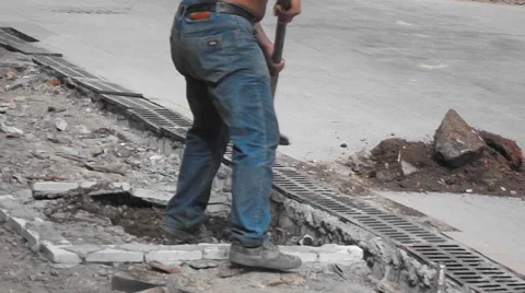 Construction workers in the pavement construction, excavation pit Stock Footage 67746391