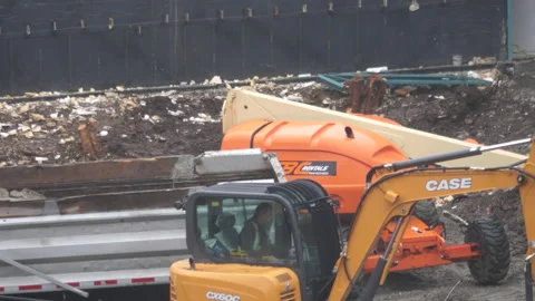 Construction workers performing duties on small industrial site 스톡 동영상 151150167