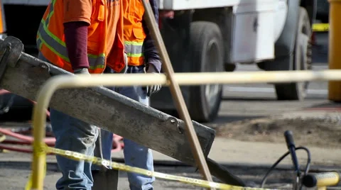 Construction workers pour concrete in building pile foundation Stock-Footage 34561391