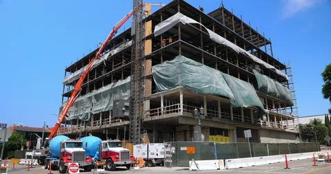 Construction workers pouring concrete at construction site in Los Angeles, 4K Stock Footage 93262373