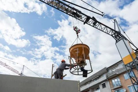 Construction workers pouring concrete 写真素材