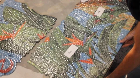 Construction workers put together mosaic tiles on the floor A 스톡 동영상 125057093