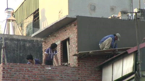 Construction workers on roof Stock Footage 288999