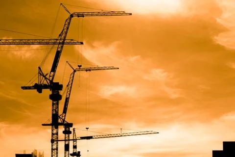Construction workers on scaffold Stock Photos