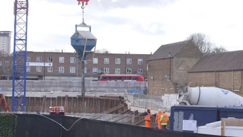 Construction Workers Securing A Cement Container Stock-Footage 150759024