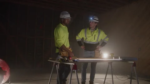 Construction Workers Shake Hands Working Together On Job Site Stock Footage 270390982