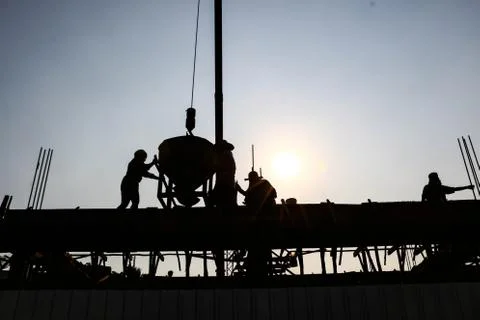 Construction Workers silhouette Stock Photos