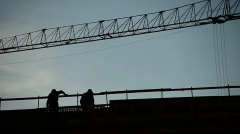 Construction workers silhouettes on building 스톡 동영상 62710626