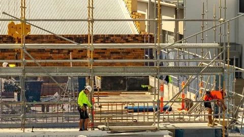 Construction workers on a site in Brisbane, Australia Stock Footage 196919384