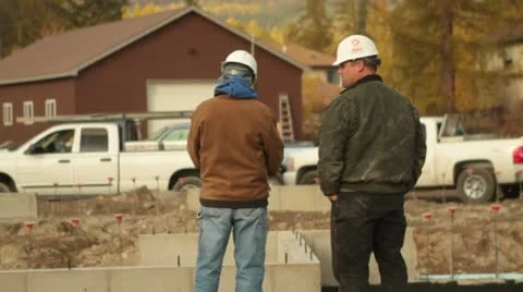 Construction workers talk Stock Footage 21558292