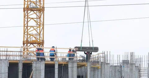 Construction workers on the top level of building site Stock-Footage 146033519
