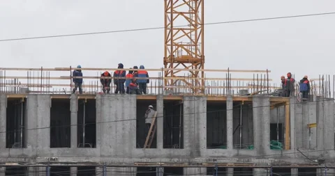 Construction workers on the top level of building Stock-Footage 146033931