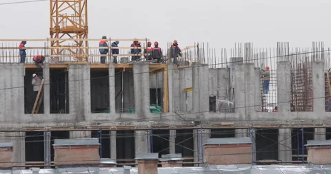 Construction workers on the top level of building Stock-Footage 146033980