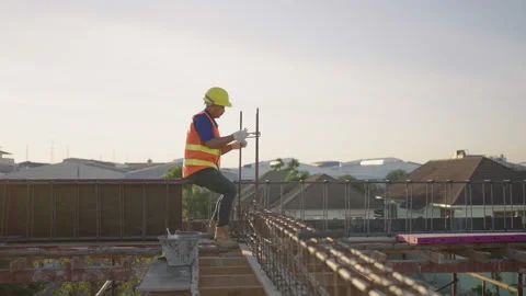 Construction workers tying steel at the construction site. Stock Footage 171958628