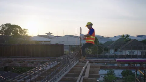 Construction workers tying steel at the construction site. Stock Footage 176906258