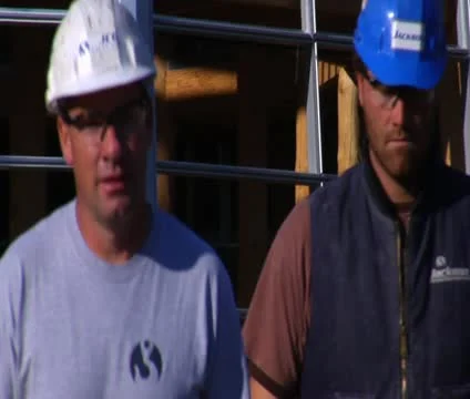 Construction workers walked toward camera Stock Footage 21559336