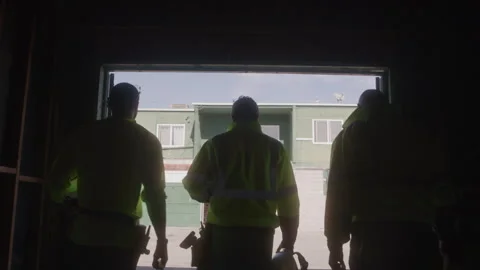 Construction Workers Walking Out Of Building Together Stock Footage 270389680