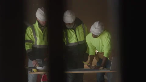Construction Workers Wearing Hard Hats On Site Stock Footage 270388096