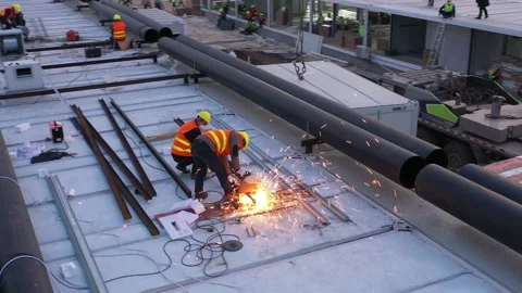 Construction workers welding, Wuhan coronavirus hospital, China Stock Footage 130541959
