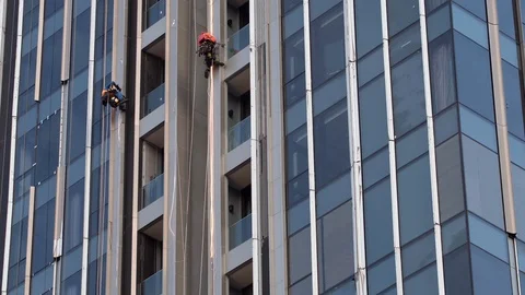 Construction workers work on building a high risk. Stock Footage 115349182