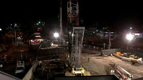 Construction workers work on a freeway o... | Stock Video | Pond5