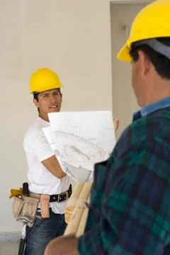 Construction Workers At Work Place Stock Photos
