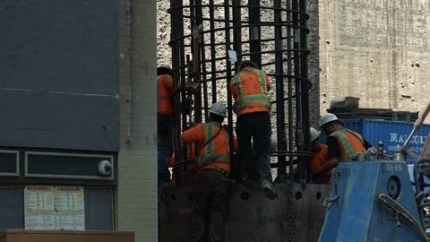 Construction workers work on reinforcing metal cable structure, San Francisco Stock Footage 96124736