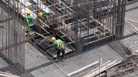 A construction workers working on a building framework. Stock Footage 317353219