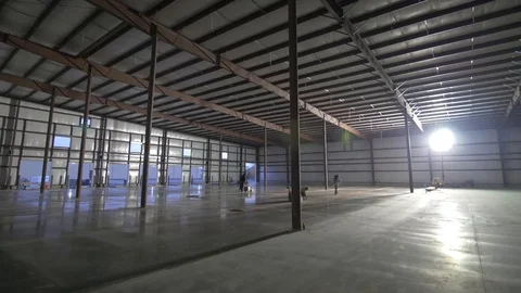 Construction Workers Working on Floor in Large Building Video stock 101390360