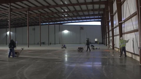 Construction Workers Working on New Cement Видео 101390353