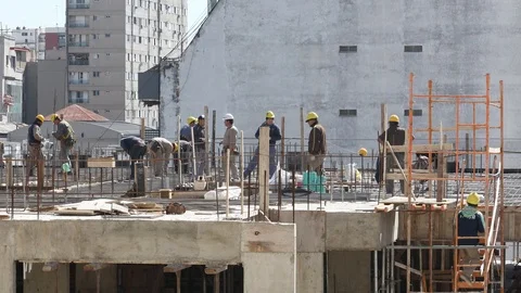 Construction workers working for the preparation of concreting on the roof of Stock Footage 116943568