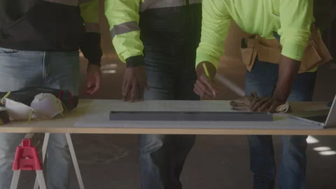 Construction Workers Write On Blueprints Stock-Footage 270388170