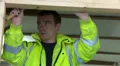 Construction working fixing window frame in place HD Footage