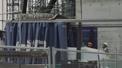 Construction - workmen using chains Stock Footage 93202549