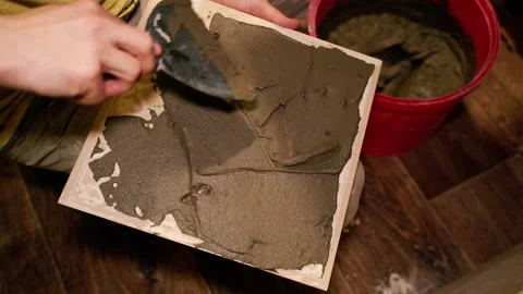 Construction works. Lay tiles on the wall. Stock Footage 168027437