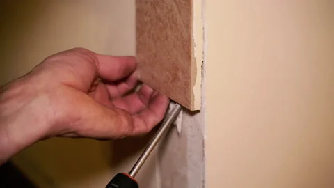 Construction works. Removing tiles from the wall. Stock Footage 168027397