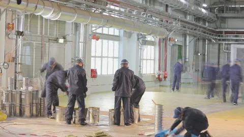 Construction of a workshop at the plant. Workers at a construction site. The Stock Footage 238508958