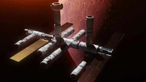 Construction of the world's first space station in Mars orbit. the concept of Stock Footage 219808973