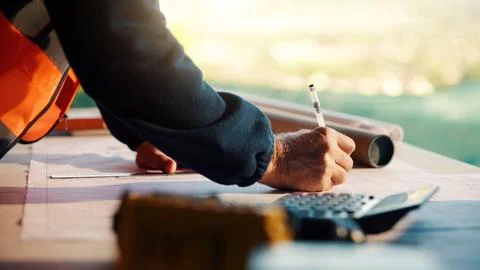 Construction, writing and hands of man with blueprint for planning, layout and Stock Photos