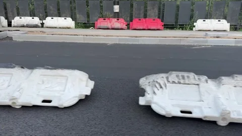 Construction zone, road repairs, sign telling you to turn left. Stock Footage 310142620