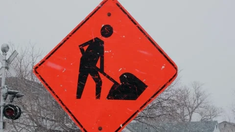 Construction Zone Sign in Winter Snowfall Street Signs Video. Stock Footage 331945181