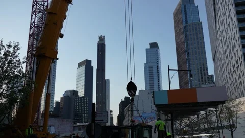 Constructions development site with workers and tower crane Stock Footage 194353155
