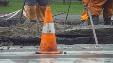 Constructions working road rain repair asphalt transportation street Stock Footage 269420078