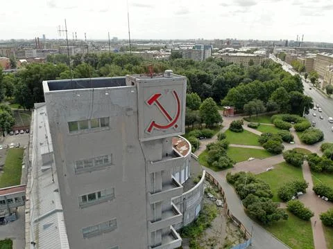 Constructivism building red hammer and sickle monument. USSR symbols. Narvskaya Photos