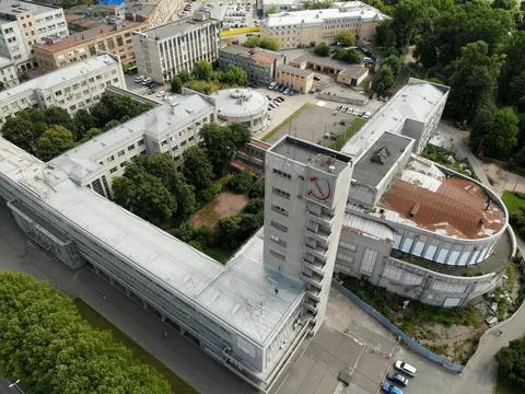 Constructivism building red hammer and sickle monument. USSR symbols. Narvskaya Photos