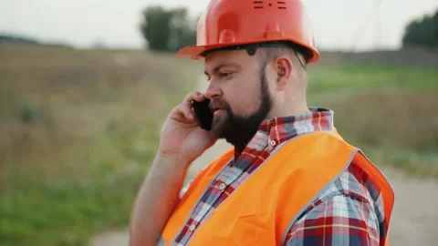 Constructor calling mobile phone Stock Footage 90886519
