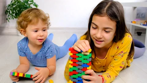 Constructor child plays in the room. Selective focus. Stock Footage 237446723