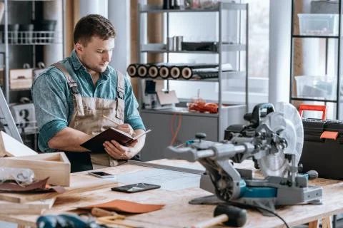 Constructor specialist projecting new engine Stock Photos